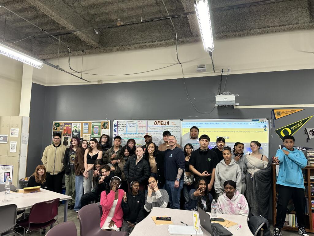 Group of PATHfinder Club members posing together in a classroom.